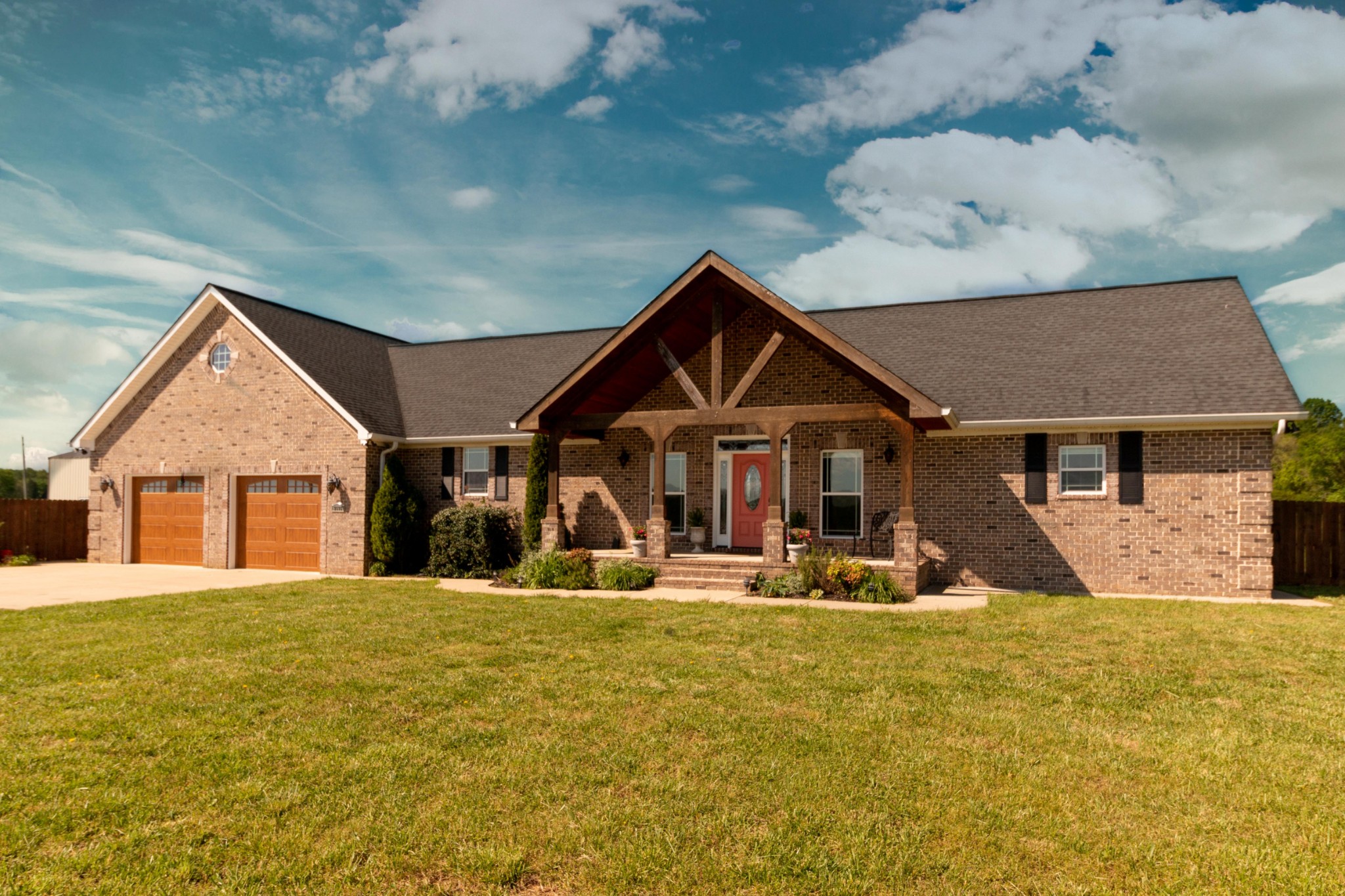 a view of a house with large space and sitting area