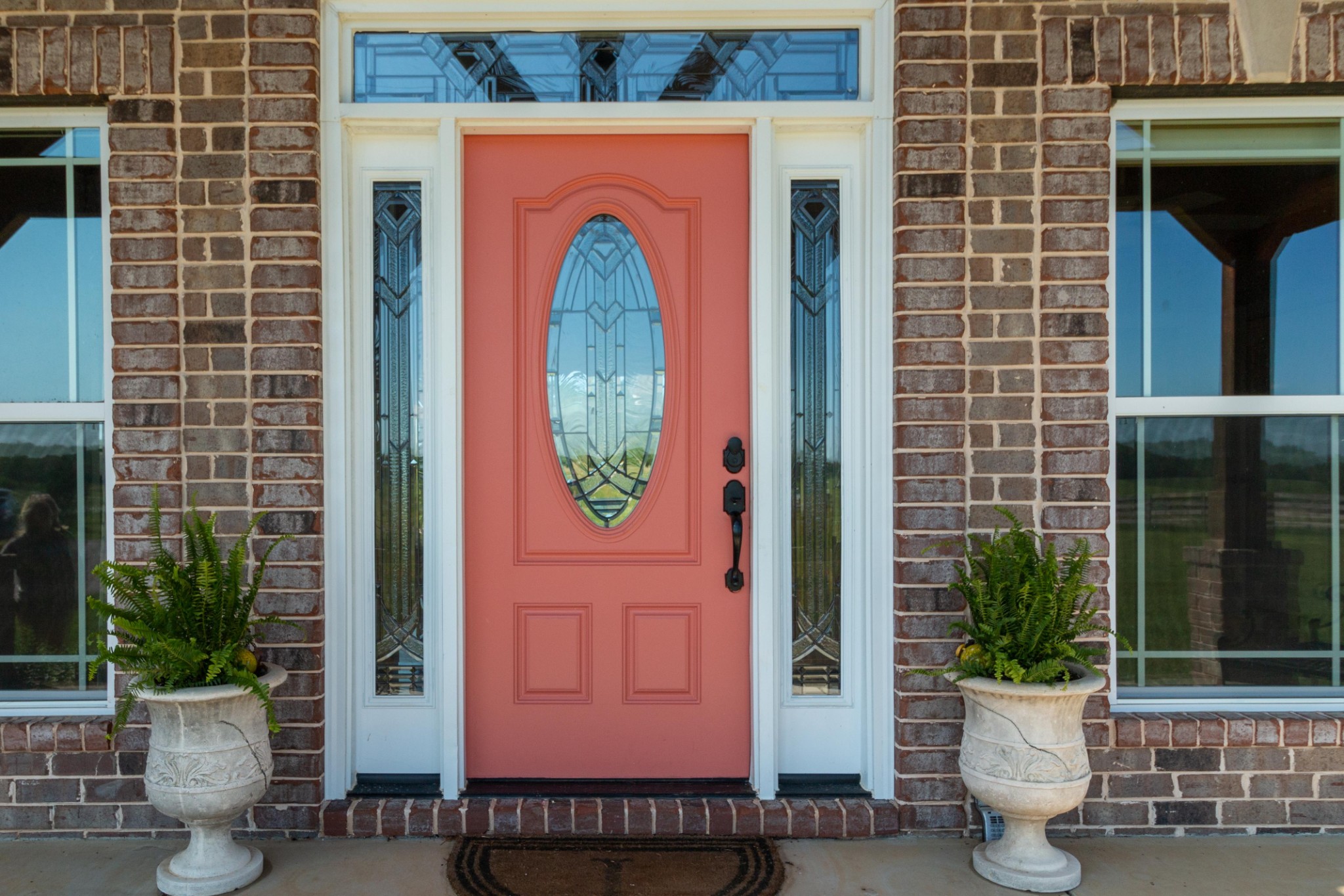 3595 Clark Road Lewisburg, TN 37091 - Photo 3 of 50 a view of a brick house with potted plants