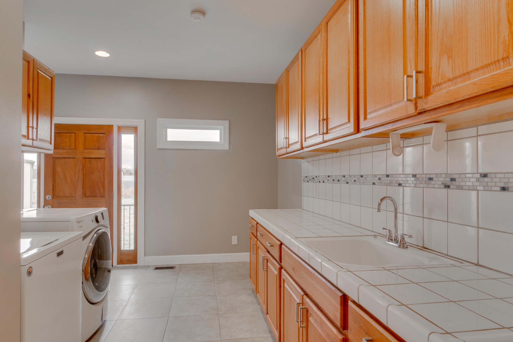 3595 Clark Road Lewisburg, TN 37091 - Photo 32 of 50 a bathroom with a sink and a washing machine