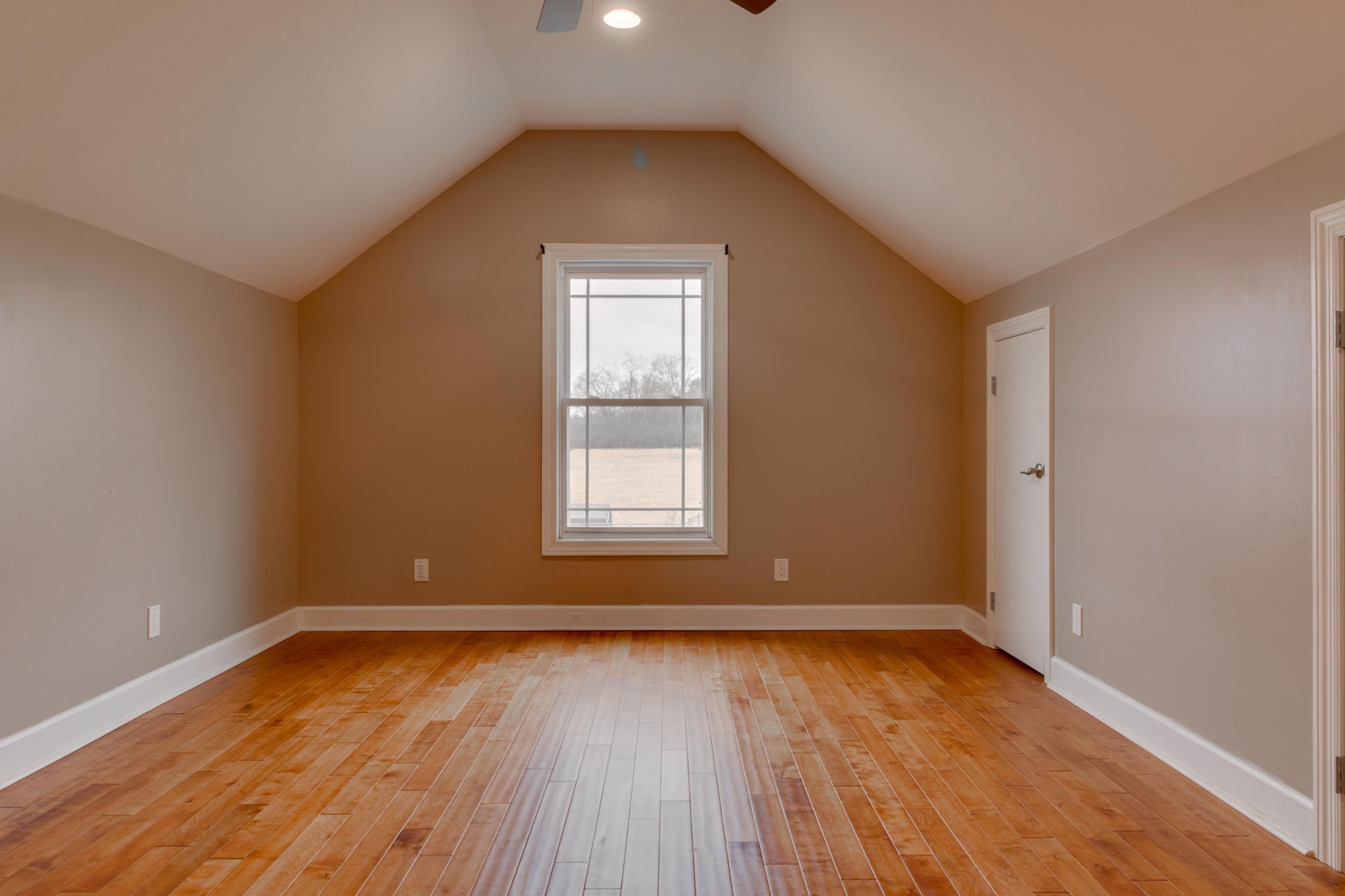 3595 Clark Road Lewisburg, TN 37091 - Photo 35 of 50 an empty room with wooden floor and windows