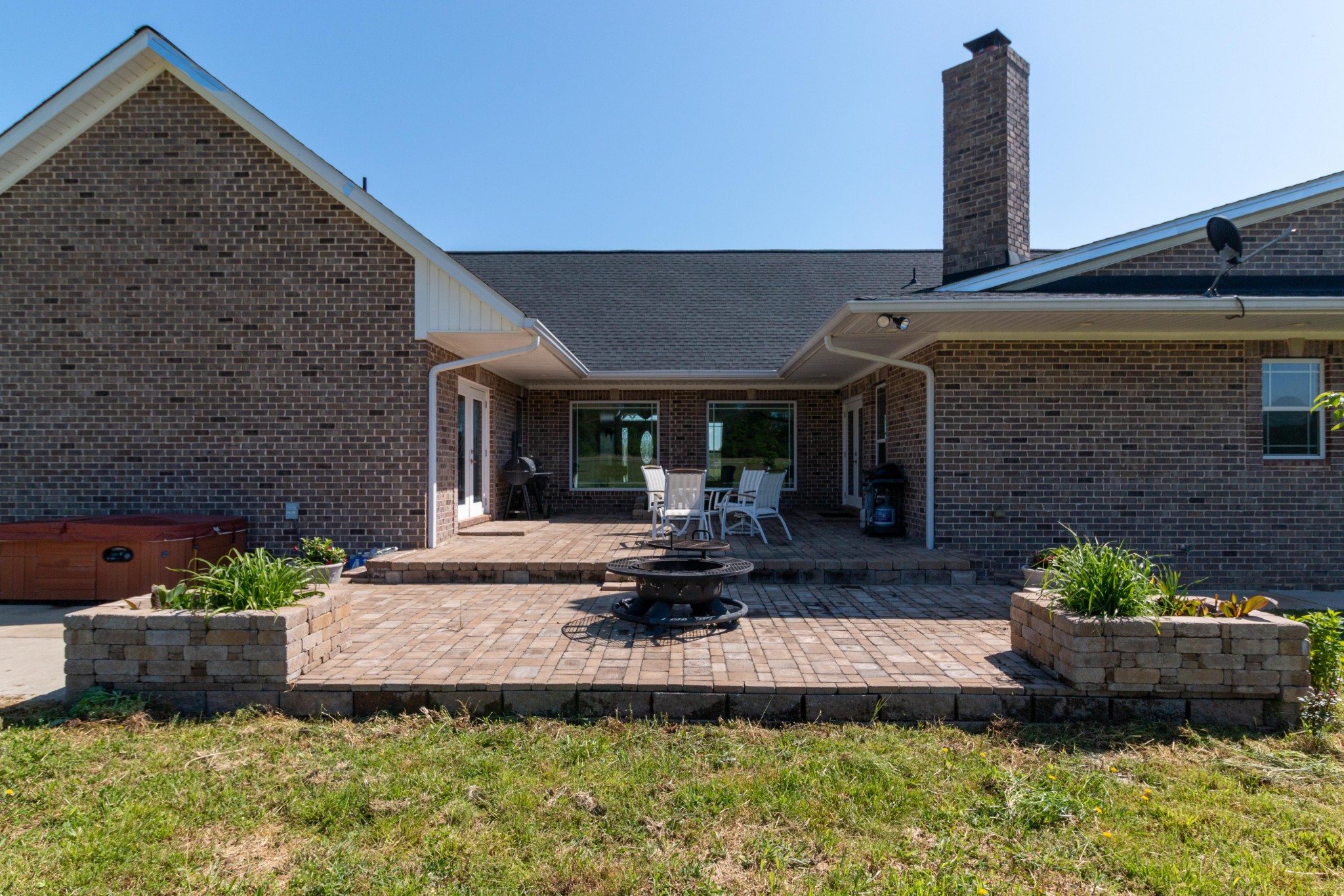 3595 Clark Road Lewisburg, TN 37091 - Photo 41 of 50 a front view of a house with a garden and patio