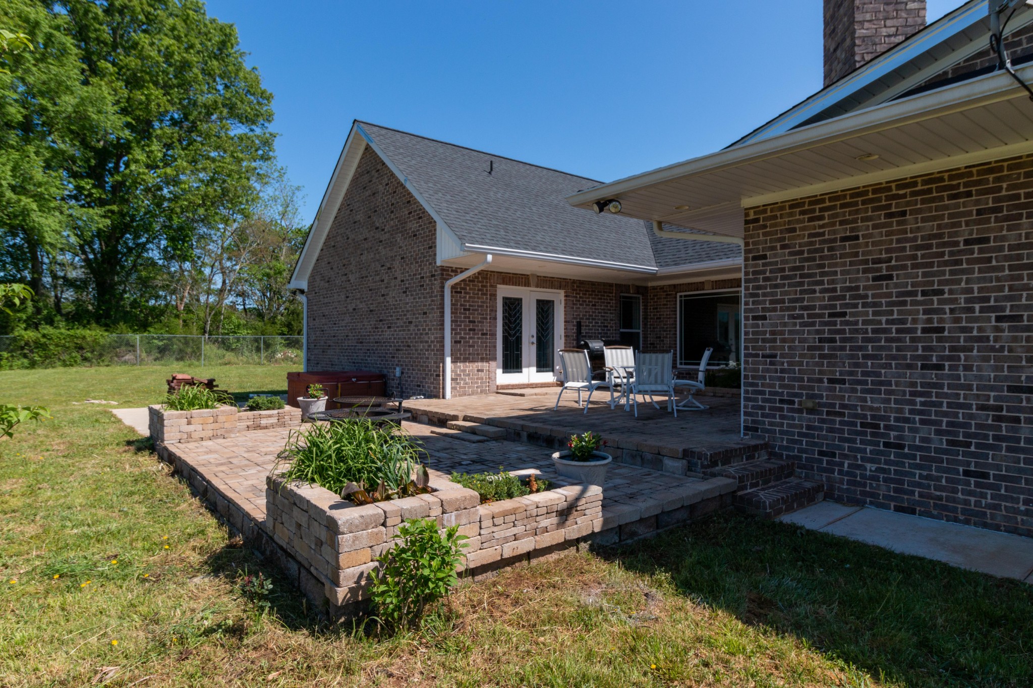 3595 Clark Road Lewisburg, TN 37091 - Photo 42 of 50 a front view of a house with garden and sitting area