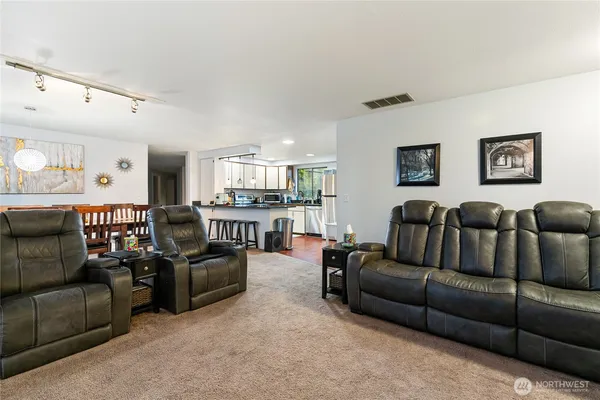 a living room with furniture and a couch