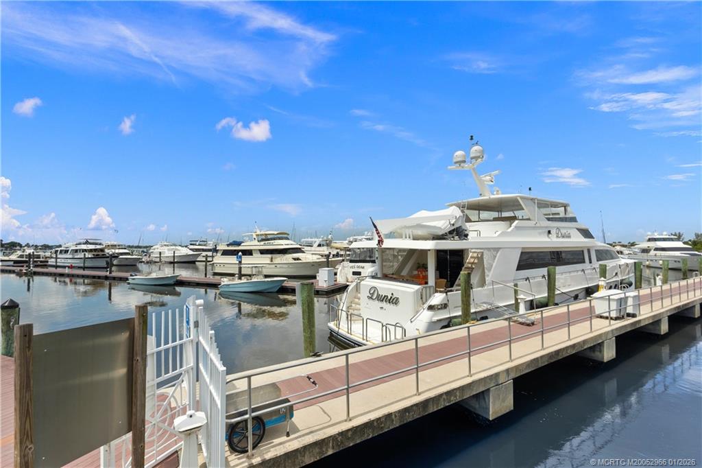 2950 Southeast Ocean Boulevard, Unit 52 Stuart, FL 34996 - Photo 23 of 31 a view of a balcony with chairs