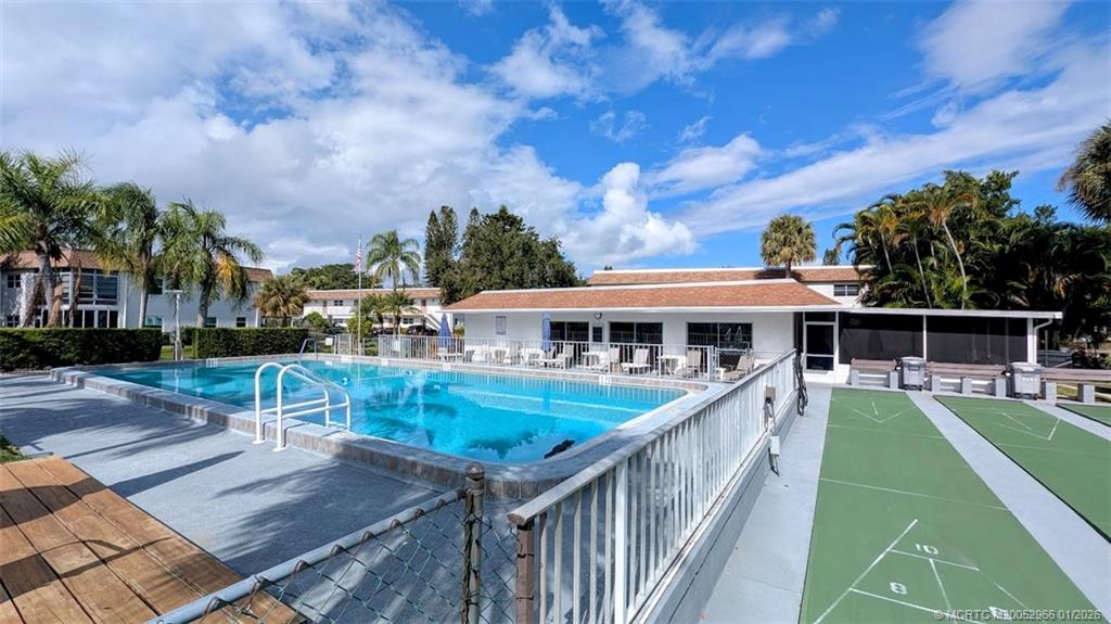 2950 Southeast Ocean Boulevard, Unit 52 Stuart, FL 34996 - Photo 31 of 31 an aerial view of house with yard space and seating