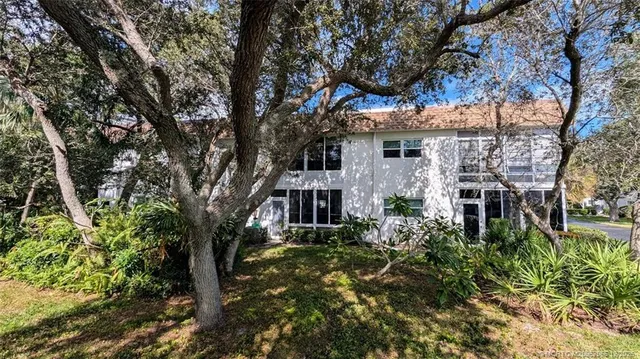 a front view of a house having yard