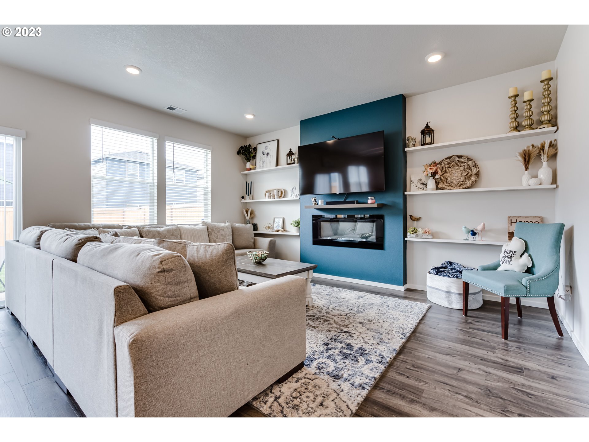 2951 Fenya Street Springfield, OR 97477 - Photo 12 of 32 a living room with furniture and a flat screen tv