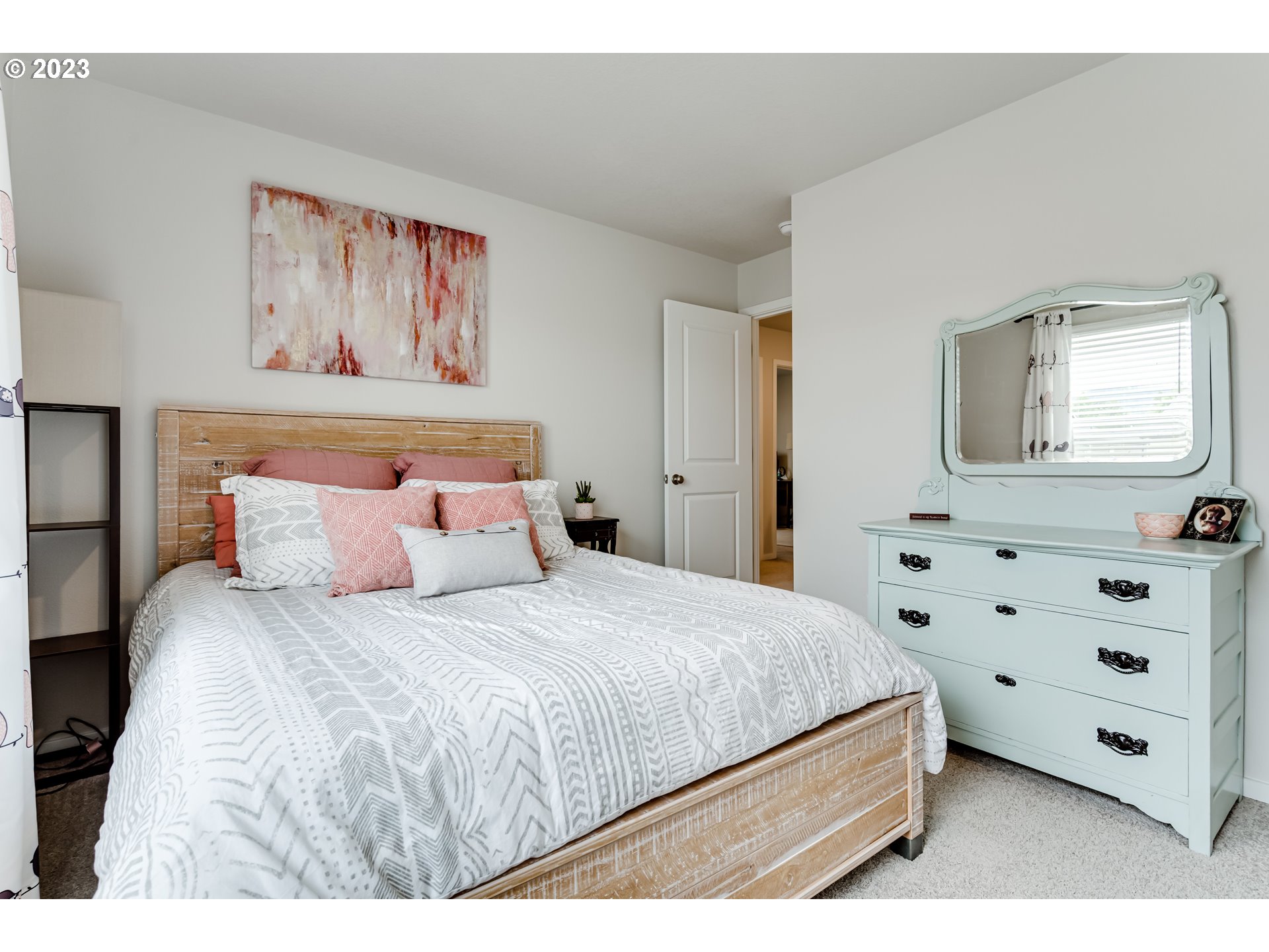 2951 Fenya Street Springfield, OR 97477 - Photo 18 of 32 a bedroom with a bed and a painting on the wall