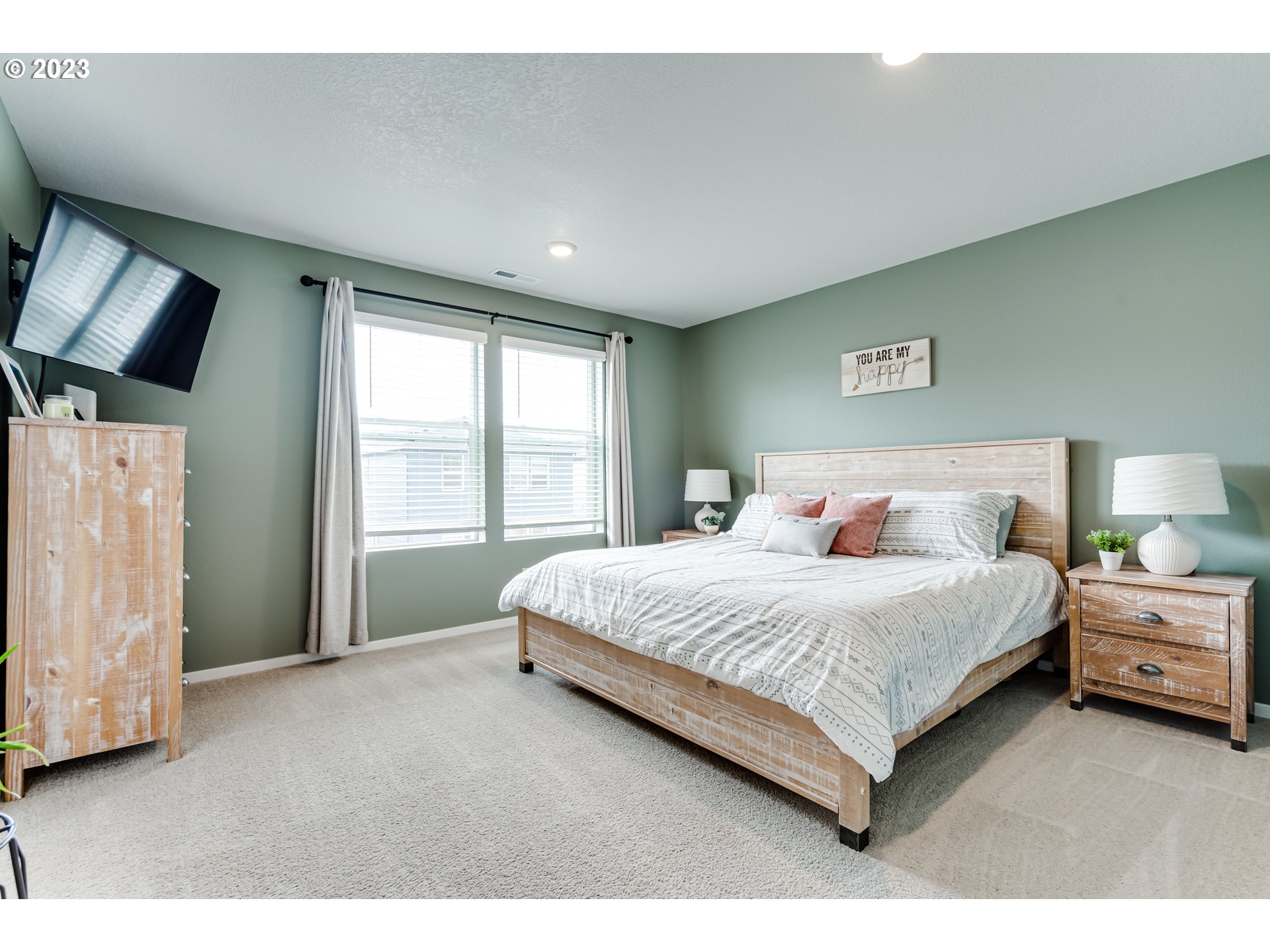 2951 Fenya Street Springfield, OR 97477 - Photo 21 of 32 a spacious bedroom with a bed and a large window