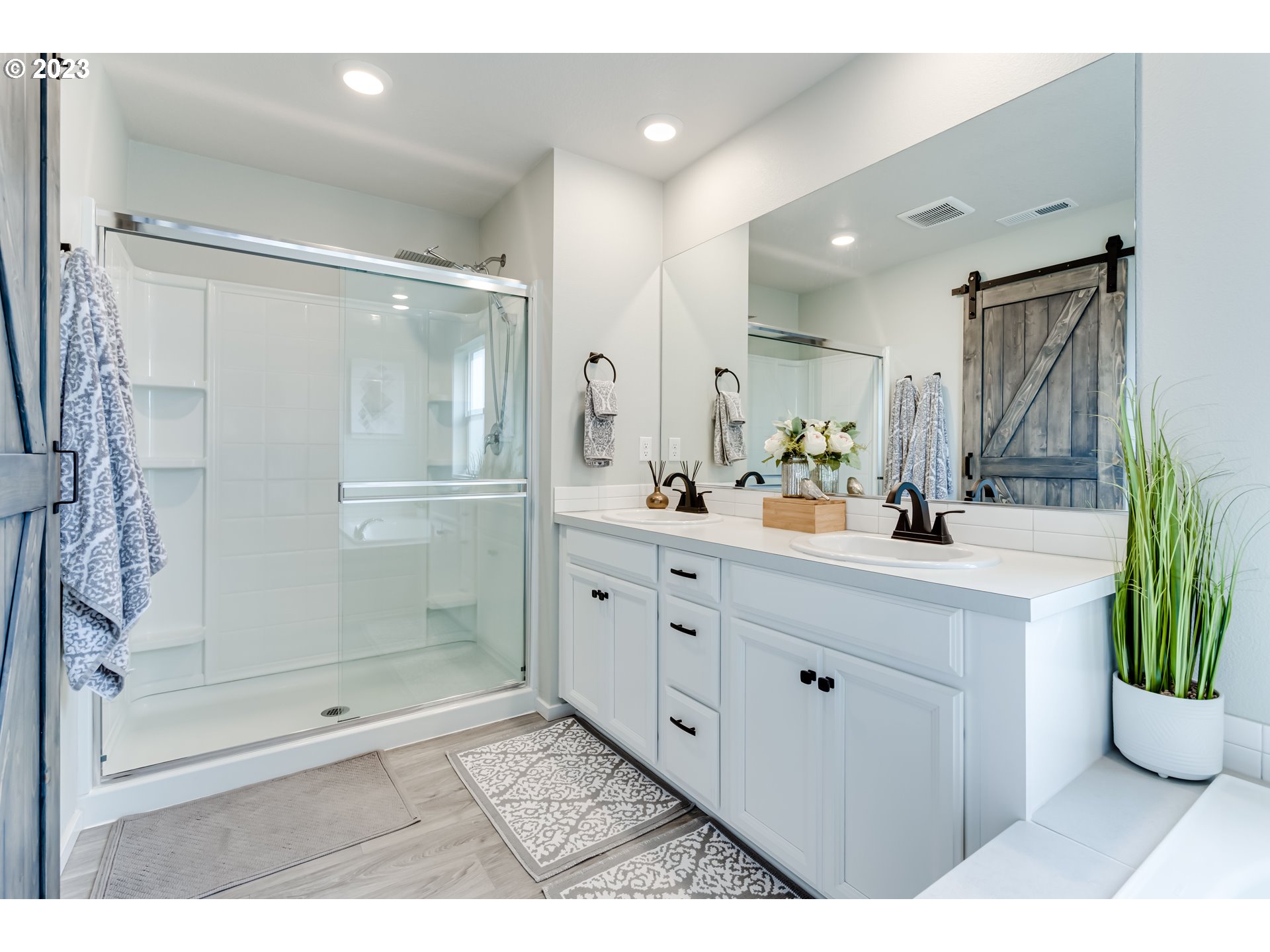 2951 Fenya Street Springfield, OR 97477 - Photo 24 of 32 a bathroom with a shower sink and mirror