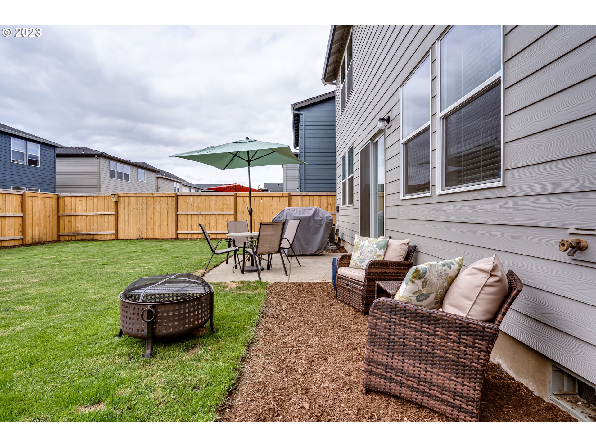 2951 Fenya Street Springfield, OR 97477 - Photo 31 of 32 a backyard of a house with table and chairs