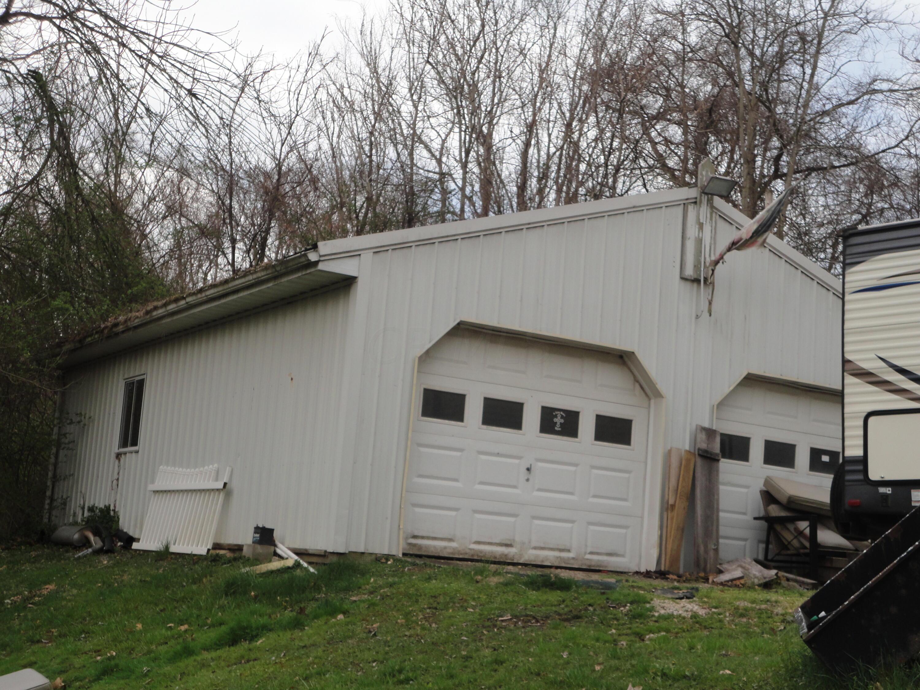 1550 Frame Road Zanesville, OH 43701 - Photo 27 of 27 2 car garage with room in rear
