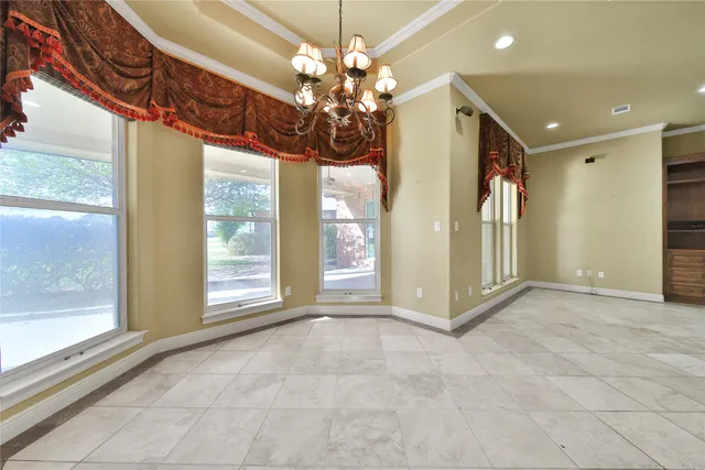 a spacious bathroom with a granite countertop sink a toilet and shower