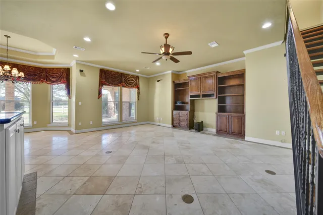 a bathroom with a granite countertop sink mirror and shower