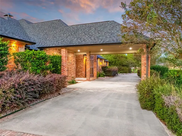 a kitchen with stainless steel appliances granite countertop a stove and a microwave