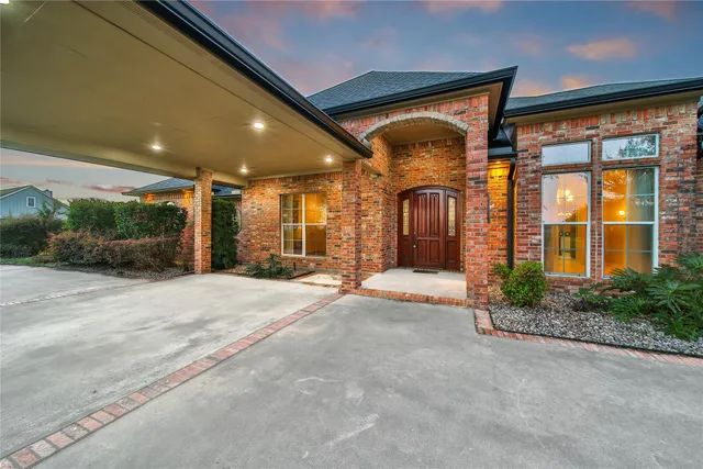 a kitchen with stainless steel appliances granite countertop a stove and a refrigerator