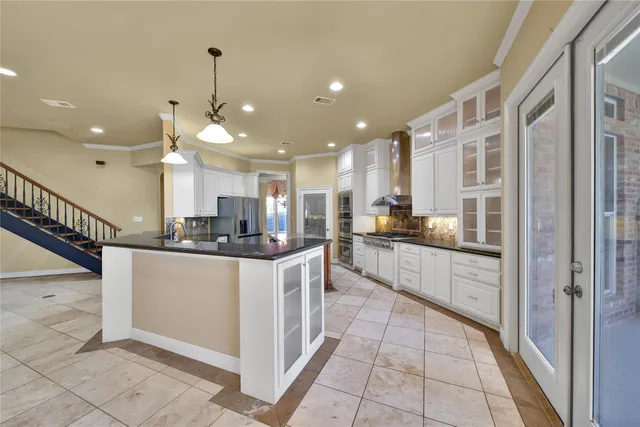 a view of an empty room with a fireplace