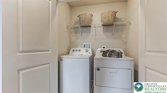 a view of a room with wooden floor and cabinet