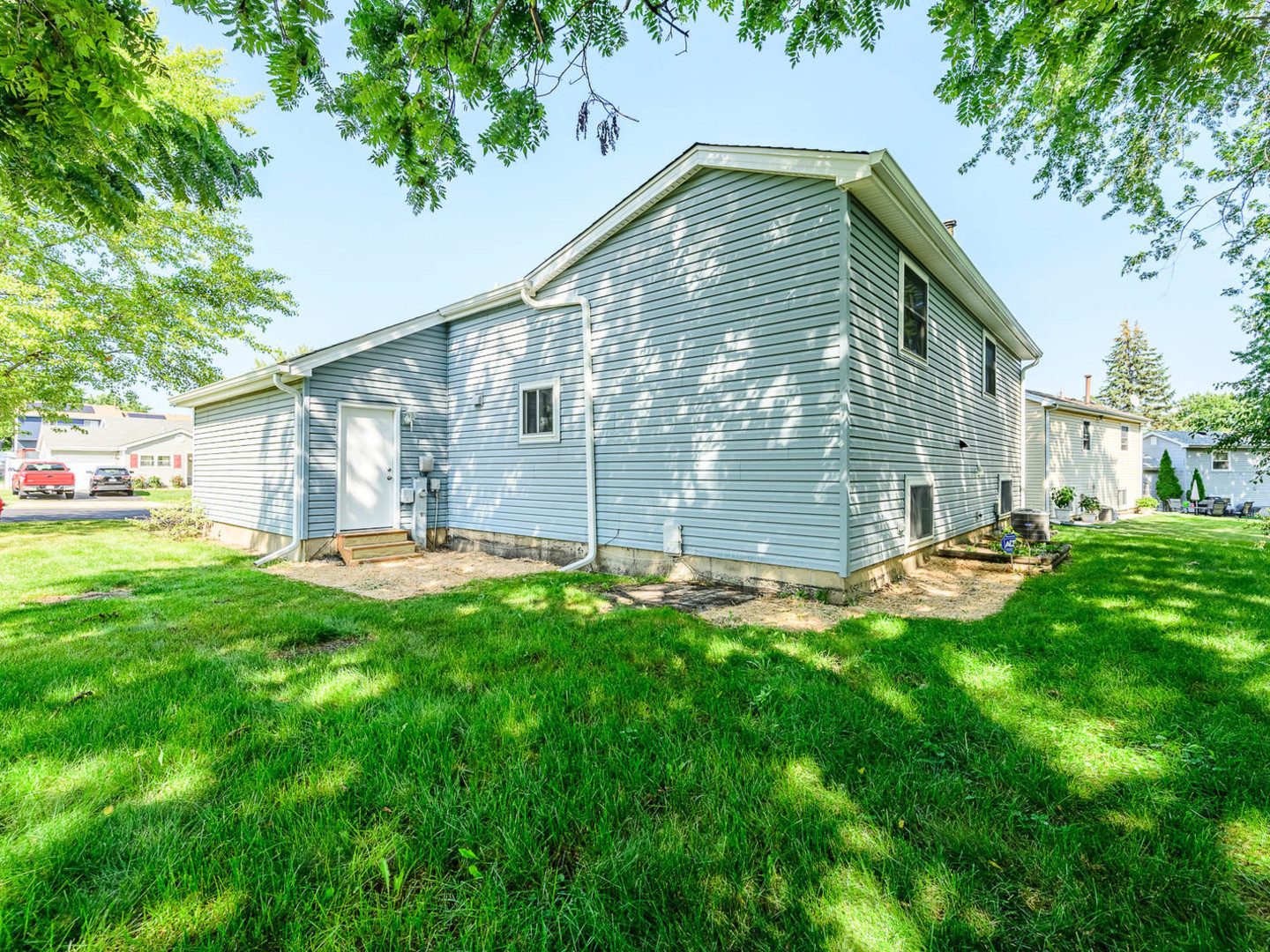 40 Fallstone Drive Streamwood, IL 60107 - Photo 12 of 13 a front view of house with yard and green space
