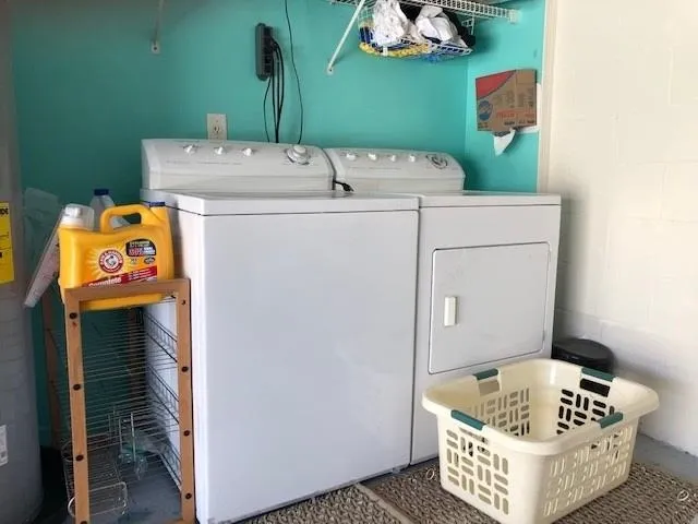 a utility room with dryer and washer