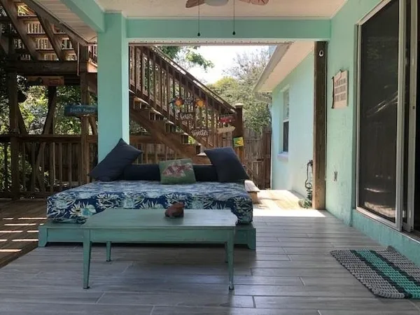 a living room with furniture and a table