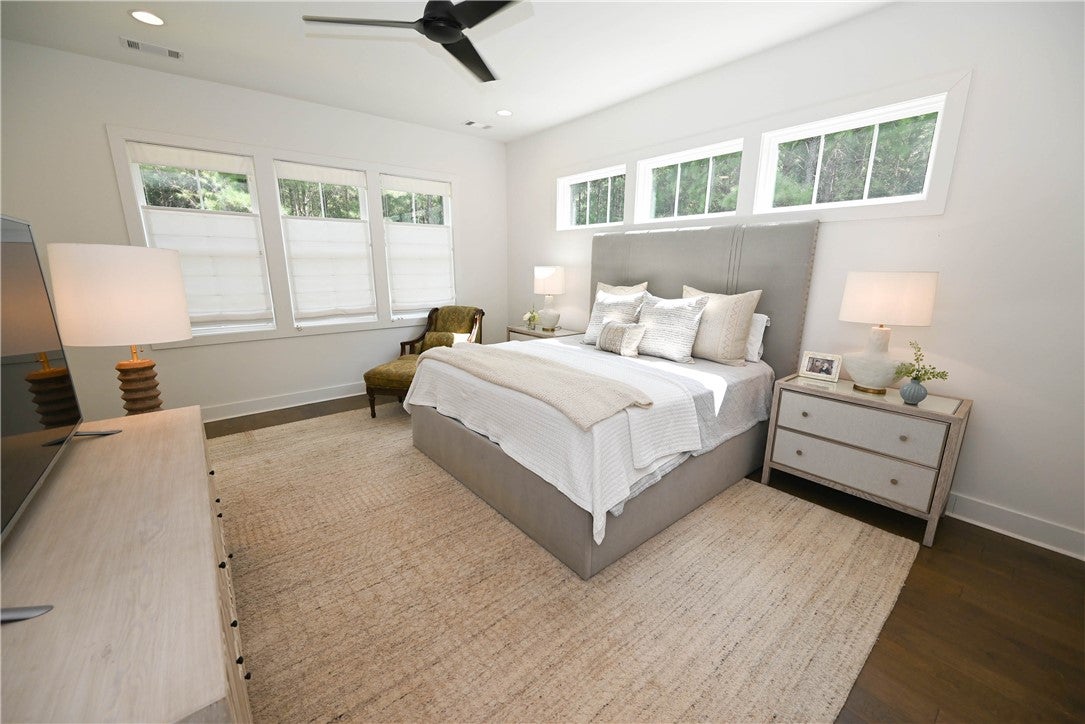 2865 Pear Tree Road Auburn, AL 36879 - Photo 25 of 49 Main level primary bedroom. Windows, windows, windows!!!!