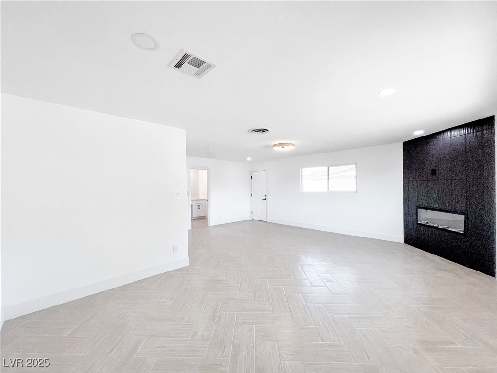 4501 South Woodcrest Road Las Vegas, NV 89121 - Photo 30 of 78 2nd primary bedroom featuring recessed lighting and a fireplace