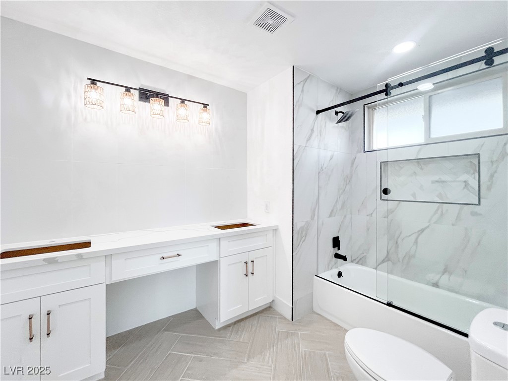 4501 South Woodcrest Road Las Vegas, NV 89121 - Photo 32 of 78 2nd primary Bathroom featuring shower / bath combination with glass door and vanity