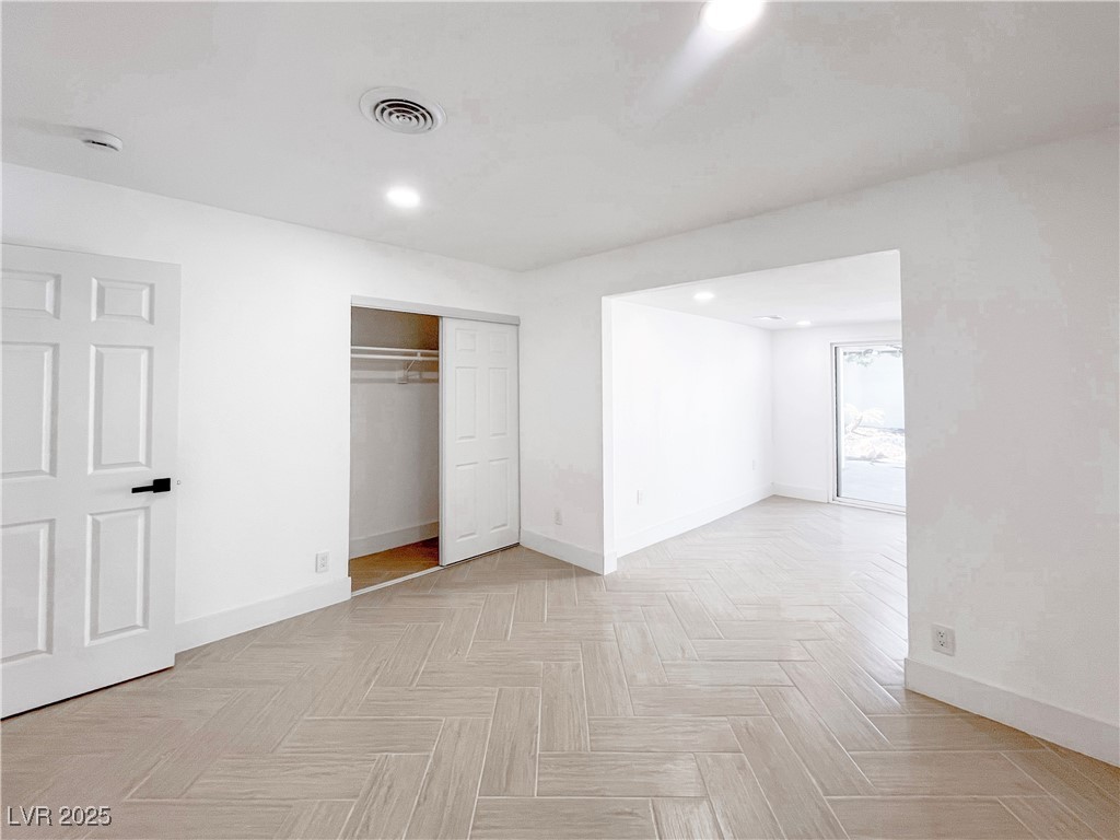 4501 South Woodcrest Road Las Vegas, NV 89121 - Photo 34 of 78 Unfurnished bedroom featuring recessed lighting and a closet