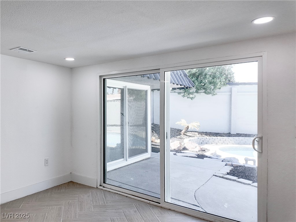 4501 South Woodcrest Road Las Vegas, NV 89121 - Photo 35 of 78 Entryway with recessed lighting and baseboards