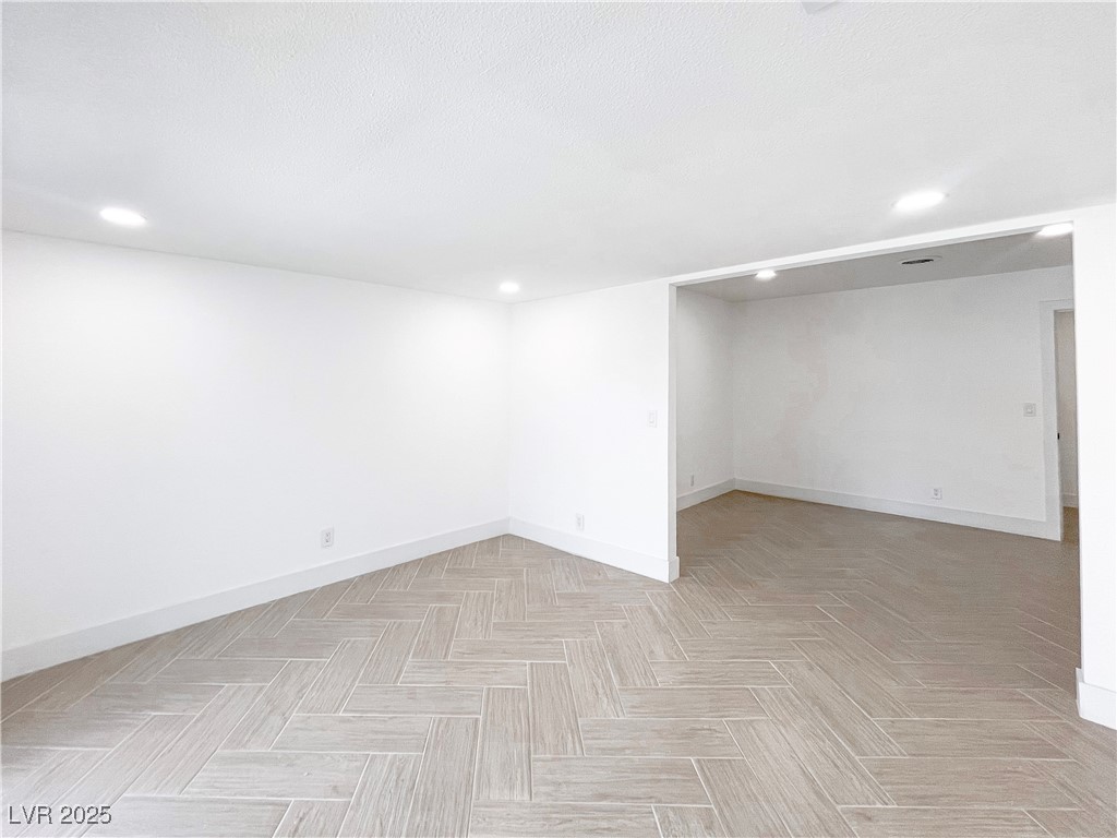 4501 South Woodcrest Road Las Vegas, NV 89121 - Photo 36 of 78 Below grade area featuring baseboards and recessed lighting