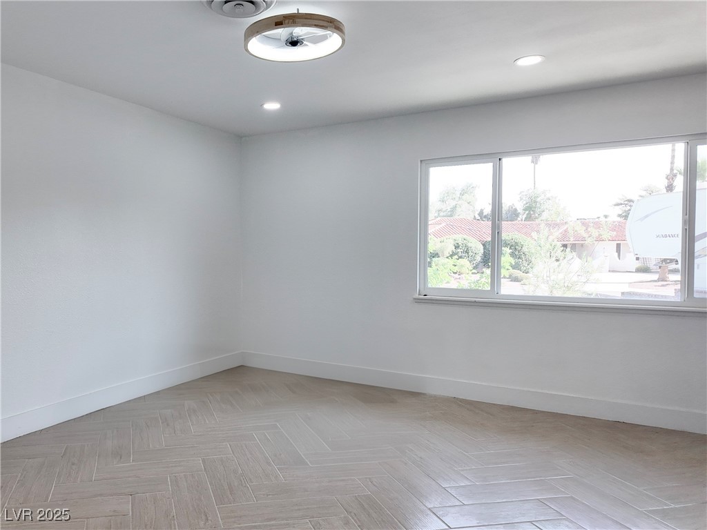 4501 South Woodcrest Road Las Vegas, NV 89121 - Photo 37 of 78 Unfurnished room with baseboards and recessed lighting