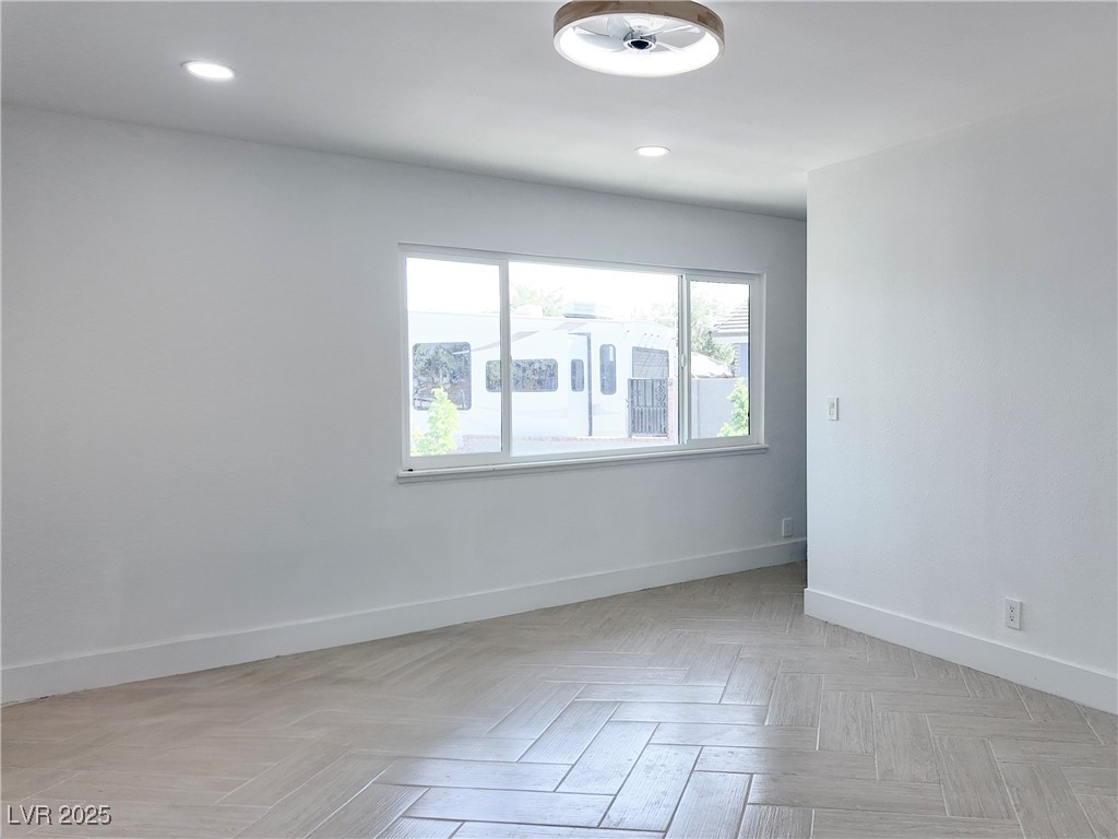 4501 South Woodcrest Road Las Vegas, NV 89121 - Photo 38 of 78 Spare room with baseboards and recessed lighting