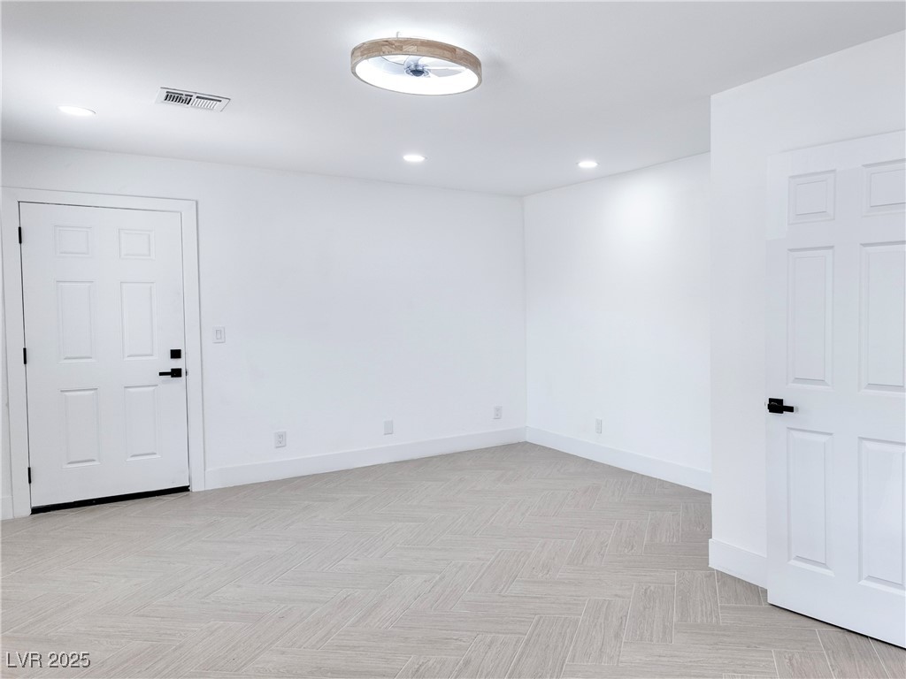 4501 South Woodcrest Road Las Vegas, NV 89121 - Photo 42 of 78 Spare room with baseboards and recessed lighting