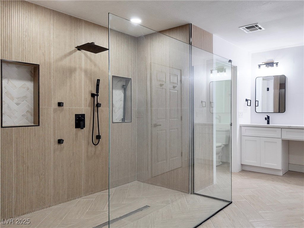 4501 South Woodcrest Road Las Vegas, NV 89121 - Photo 56 of 78 Full bath with walk in shower and vanity