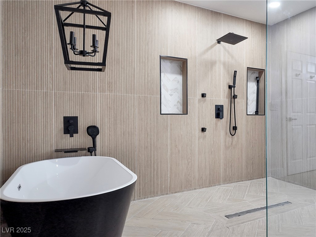 4501 South Woodcrest Road Las Vegas, NV 89121 - Photo 57 of 78 Full bath featuring a freestanding bath and tiled shower