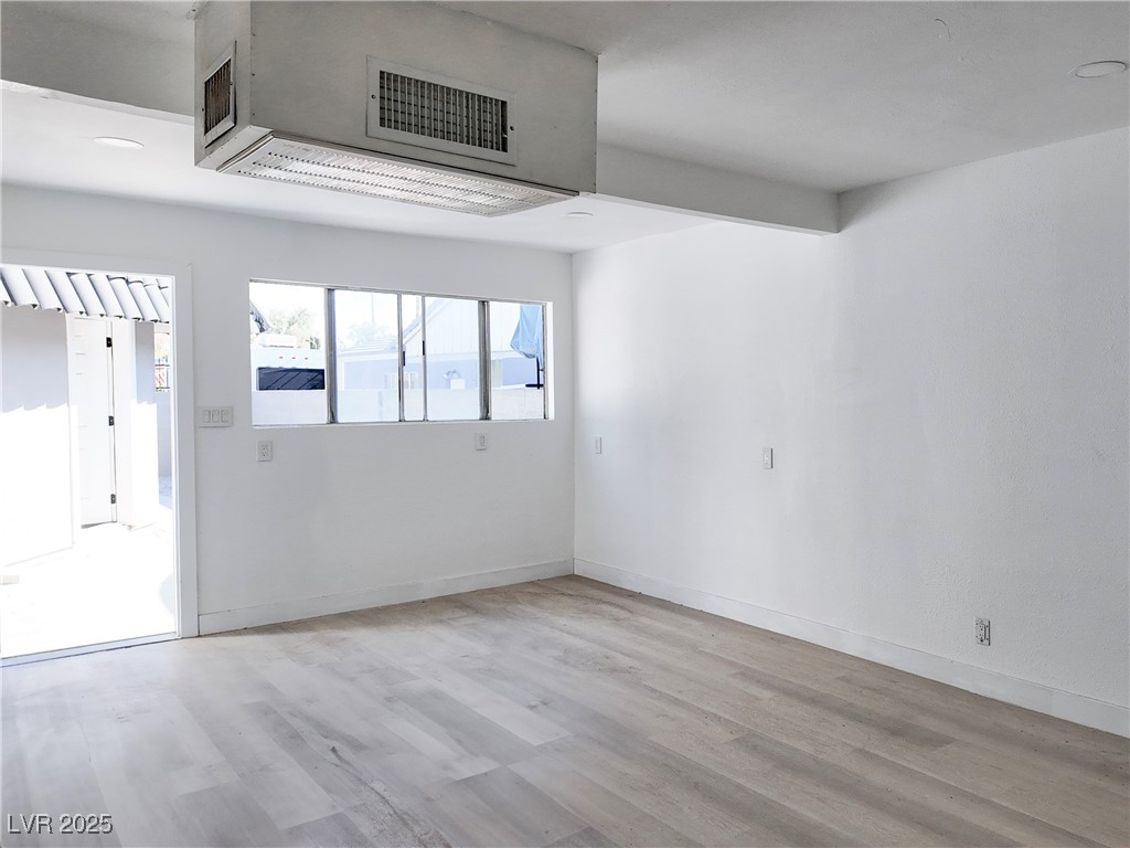 4501 South Woodcrest Road Las Vegas, NV 89121 - Photo 62 of 78 WORKSHOP/STUDIO featuring light wood finished floors and recessed lighting