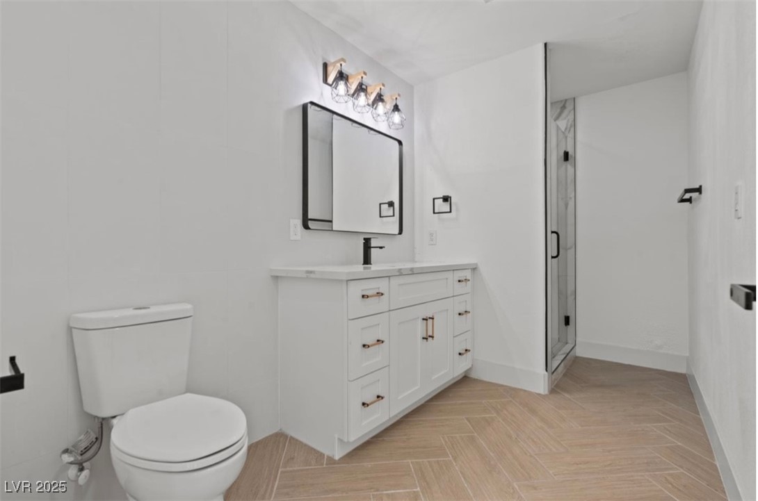 4501 South Woodcrest Road Las Vegas, NV 89121 - Photo 69 of 78 ATTACHED APPARTMENT Bathroom with vanity and a shower stall
