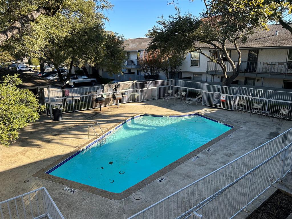 12888 Montfort Drive, Unit 167 Dallas, TX 75230 - Photo 5 of 5 a view of a backyard with sitting area