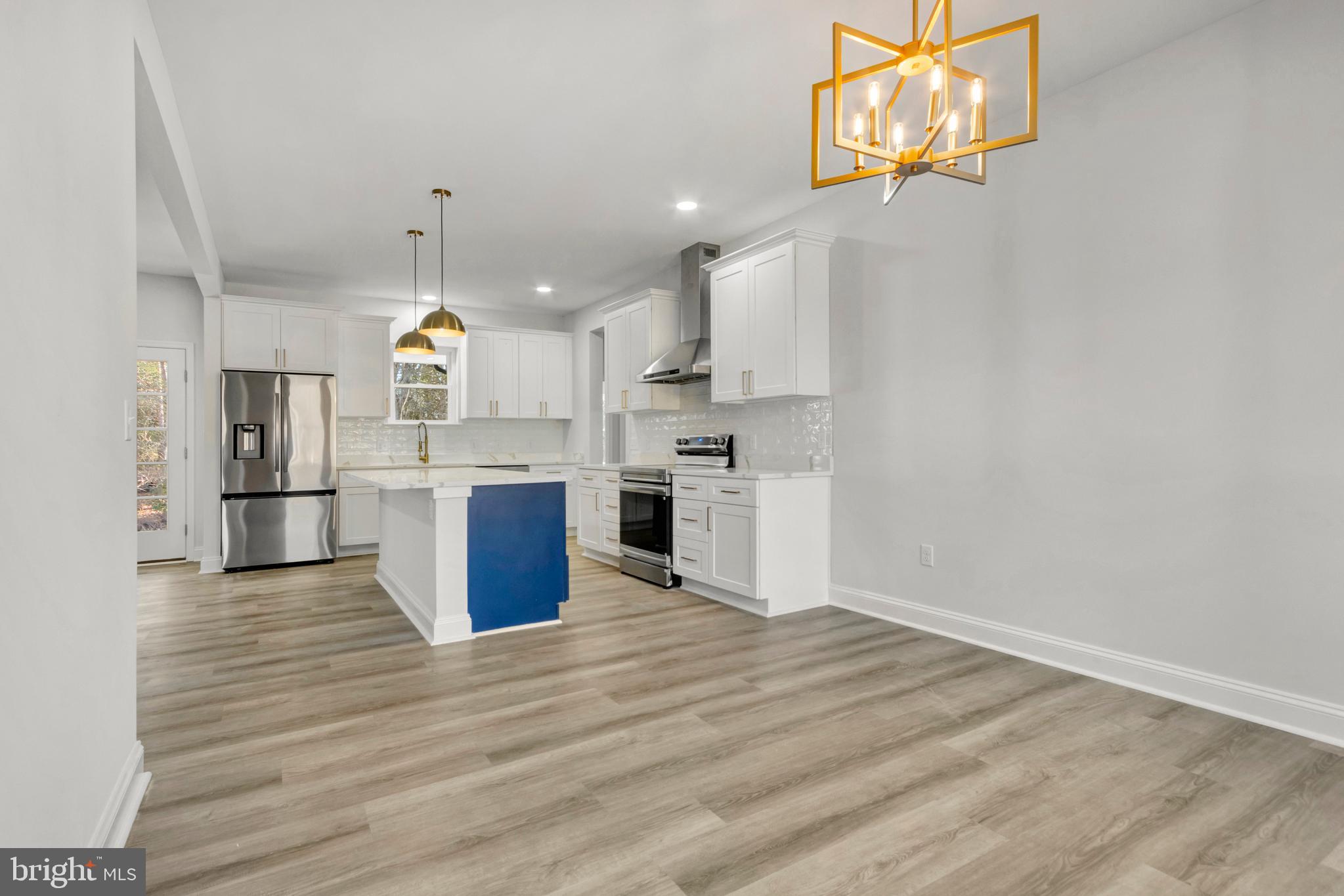 22527 Lawson Road Georgetown, DE 19947 - Photo 25 of 53 a view of kitchen with wooden floor