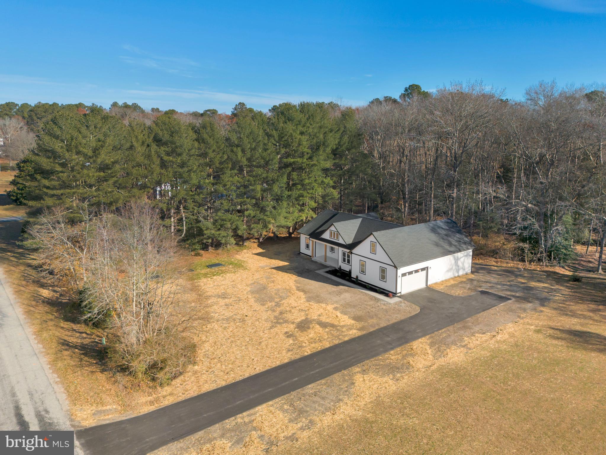 22527 Lawson Road Georgetown, DE 19947 - Photo 3 of 53 a view of a backyard with a sitting area