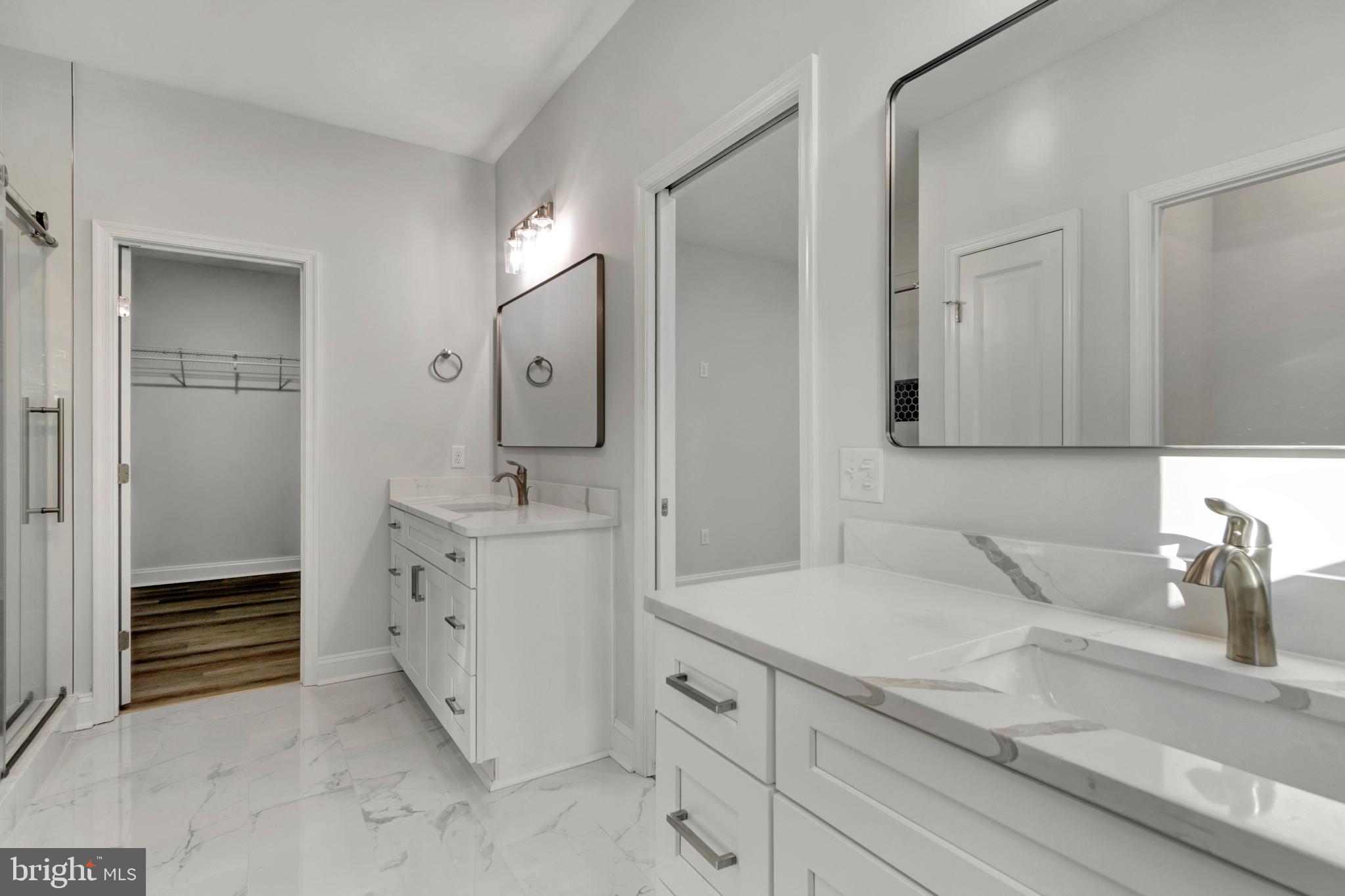 22527 Lawson Road Georgetown, DE 19947 - Photo 32 of 53 a bathroom with a sink and a mirror