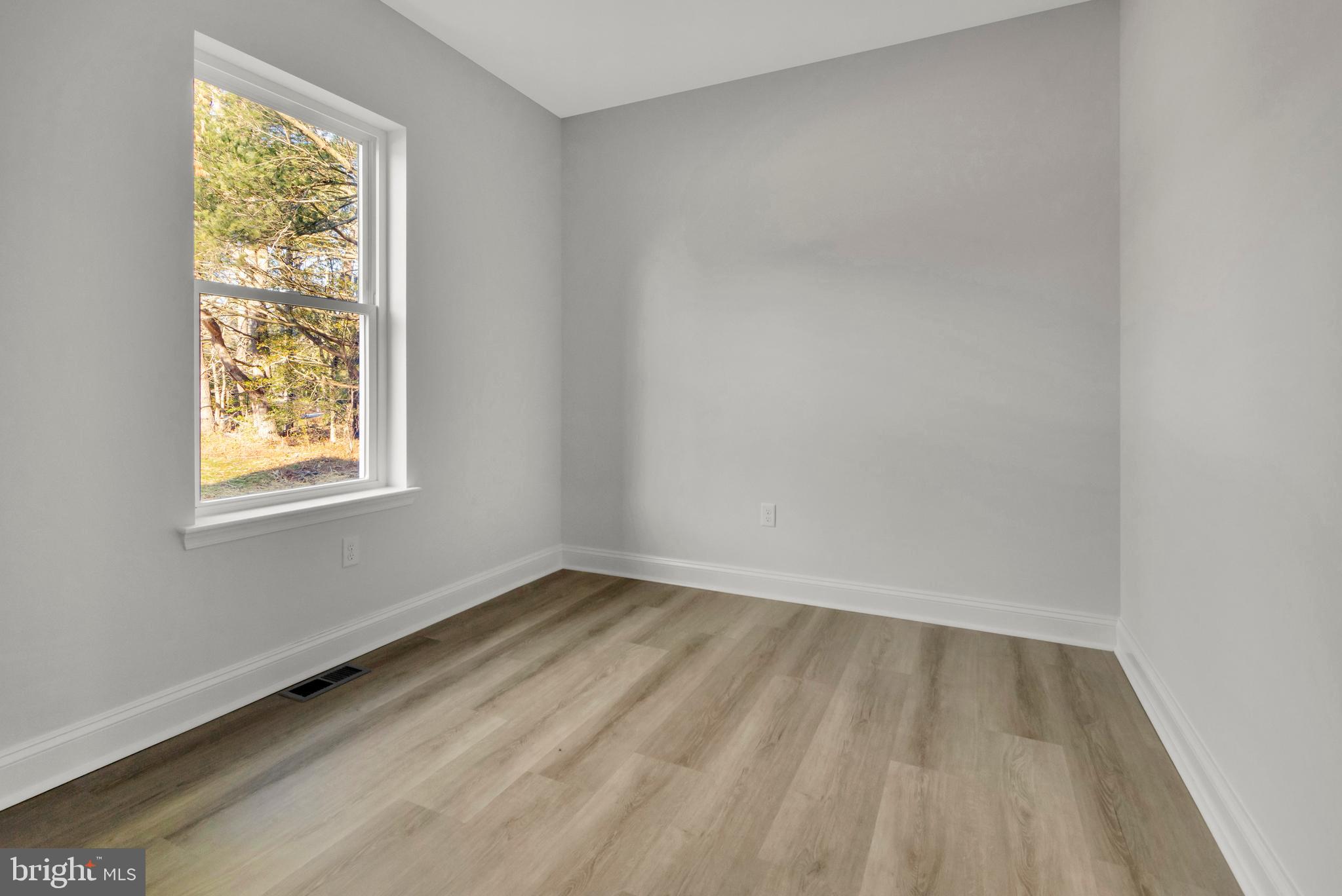 22527 Lawson Road Georgetown, DE 19947 - Photo 44 of 53 an empty room with a window
