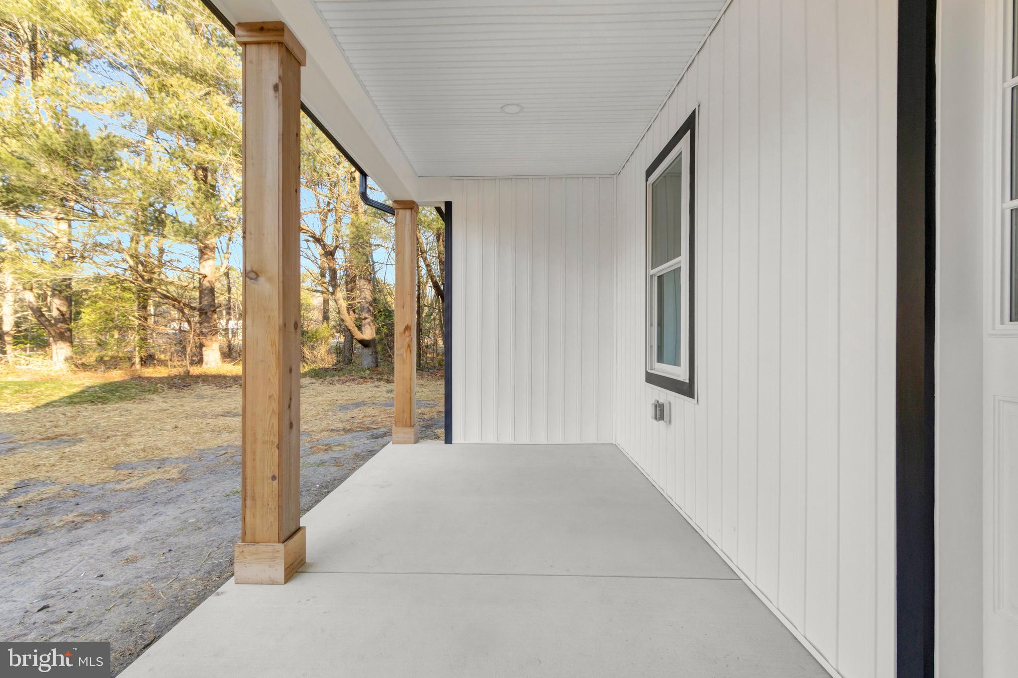 22527 Lawson Road Georgetown, DE 19947 - Photo 7 of 53 a very nice looking room with a large window