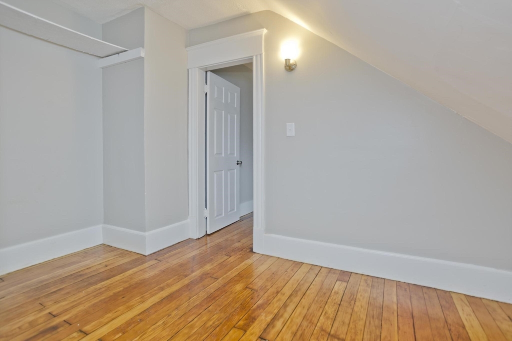 107 Orange Street Springfield, MA 01108 - Photo 38 of 38 wooden floor in an empty room