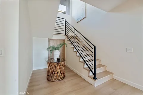 a view of entryway with wooden floor