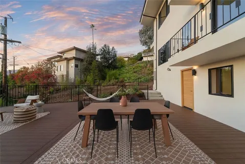 a view of a patio with couches table and chairs