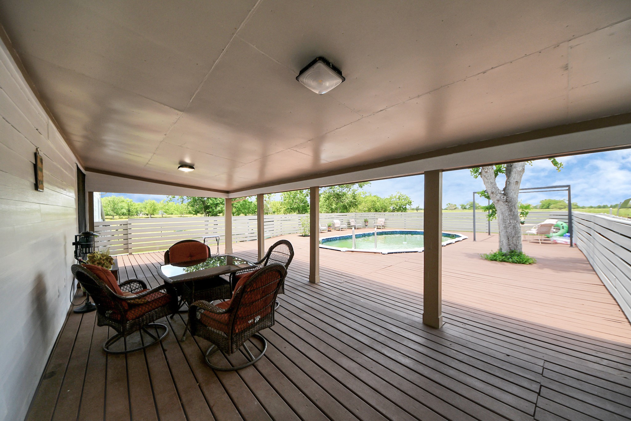 9832 Providence Road Needville, TX 77461 - Photo 30 of 41 Back porch over looking pool and property