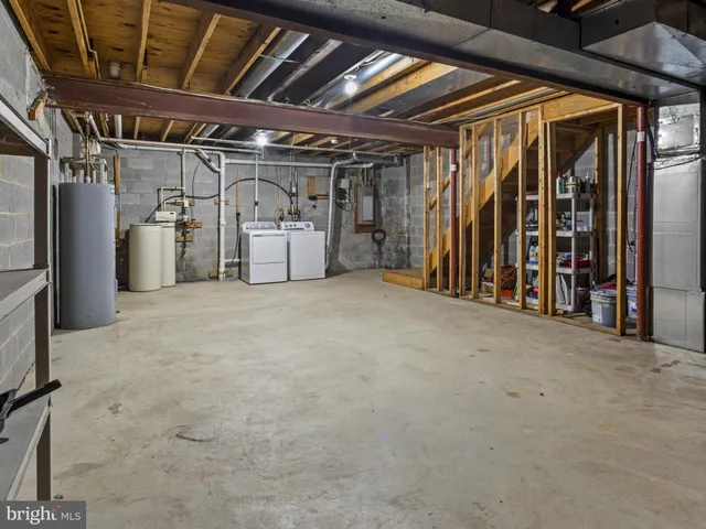 a view of an empty room with wooden roof