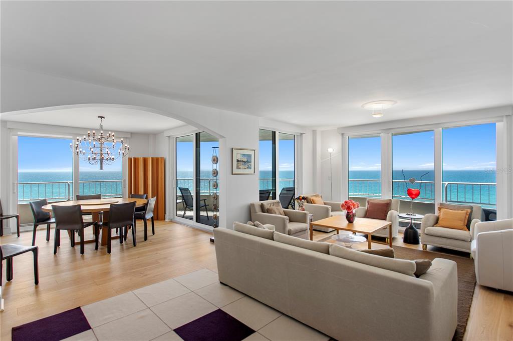 775 Longboat Club Road, Unit 808 Longboat Key, FL 34228 - Photo 9 of 41 a living room with furniture and a large window